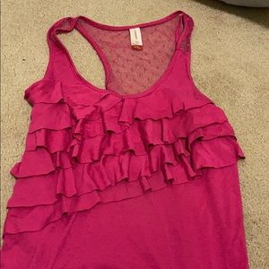 Women’s pink tank, with ruffles on front.